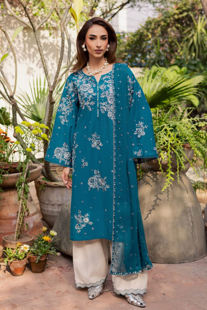 BATIK Teal Ocean 3Pc embroidered festive pret dress with floral patterns, featuring a teal shirt, white trousers, and matching dupatta.