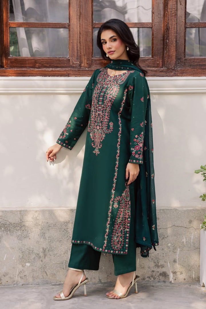 BATIK Rain 3Pc embroidered khaddar dress in deep green with floral detailing, featuring a long shirt, loose trousers, and crinkle dupatta.