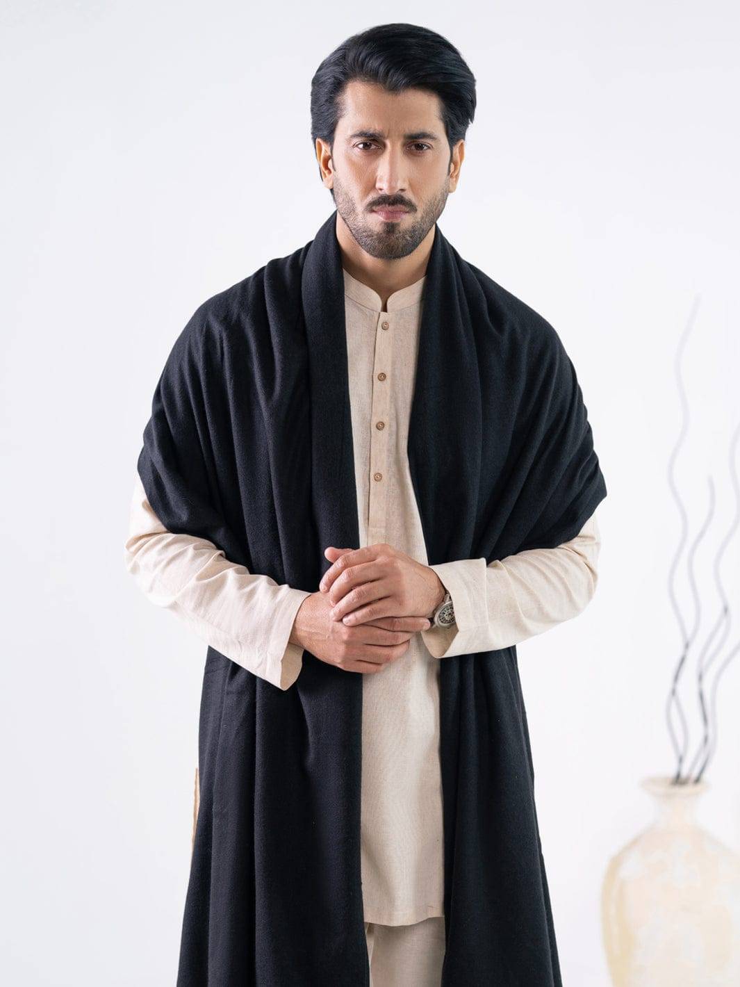 ALMIRAH Black Casual Shawl AL-SH-040-11 styled with ethnic wear, showcasing a warm, elegant winter accessory for men in the Pakistani shawls range.
