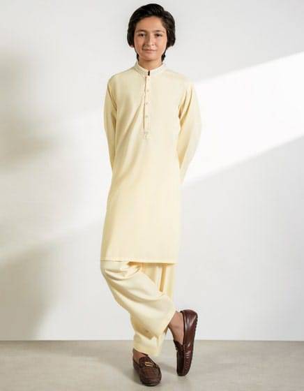 Light Beige J. Boys Kurta Shalwar with traditional styling, perfect for Eid celebrations and everyday comfort with a neat finish.