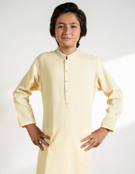 J. Boys Beige Kameez Shalwar with embroidered neckline, offering a stylish and modest look for Eid and traditional occasions.