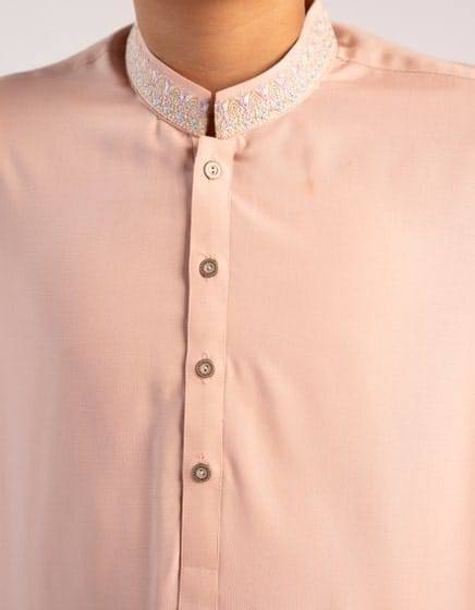 Close-up of J. PINK boys kurta collar with intricate embroidery and button details, showcasing fine craftsmanship and modern styling.