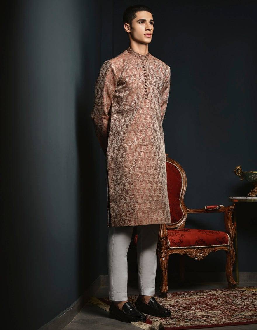 J. ROSE GOLD - Pakistani Boys Kurta USA in rose gold with intricate pattern, long sleeves, and buttoned neckline. Ideal for festive or formal wear.