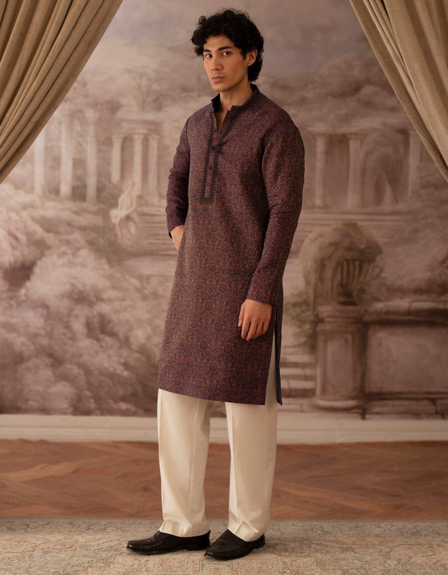J. PEACH BLUE Buy Junaid Jamshed Boys Kurta |New Arrivals, featuring a full-length view of the peach blue blended kurta with intricate patterns.