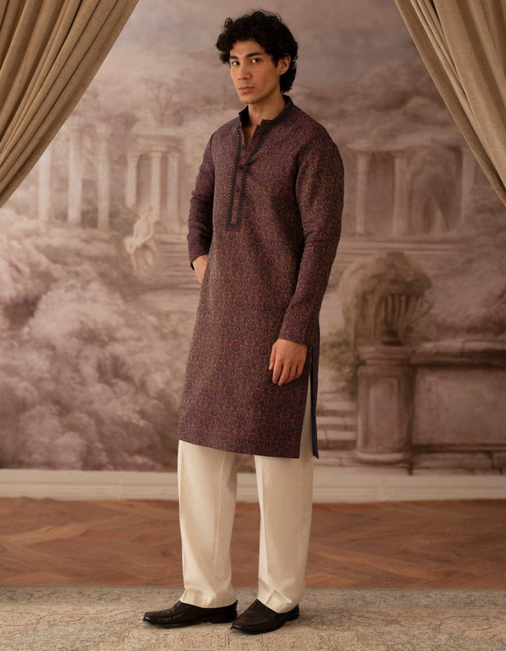 J. PEACH BLUE Buy Junaid Jamshed Boys Kurta |New Arrivals, featuring a full-length view of the peach blue blended kurta with intricate patterns.
