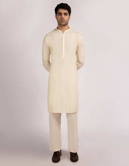 J. BEIGE COTTON FORMAL KURTA - Buy Stitched Junaid Jamshed Kurta in light beige with full sleeves and straight hem, perfect for casual events.
