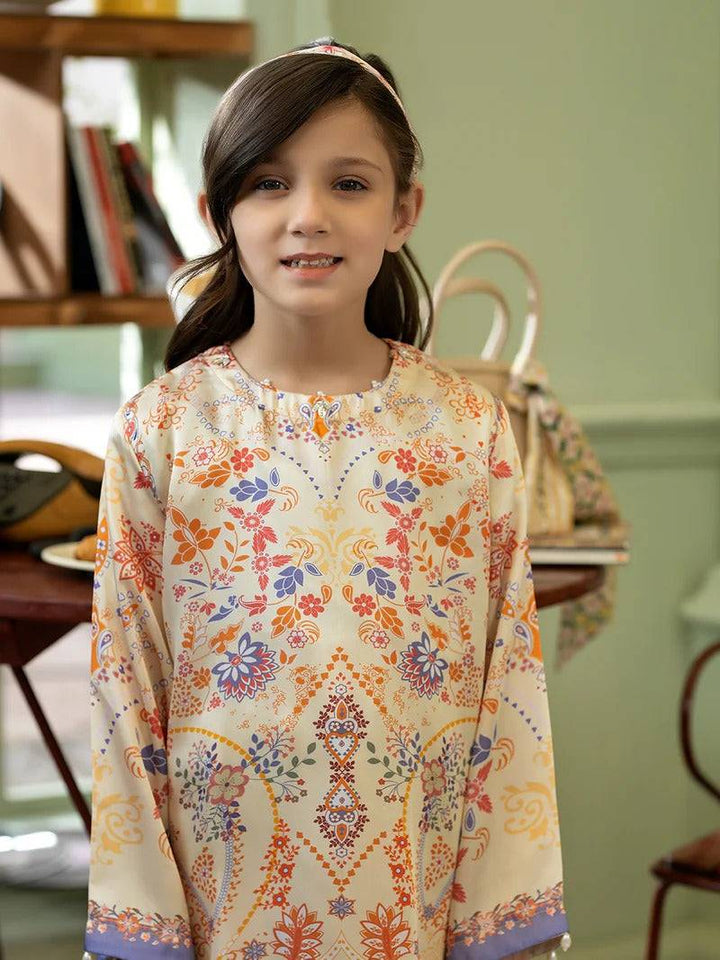 Girl wearing Rangreza Silk 2 Piece in a floral printed silk shirt and trousers