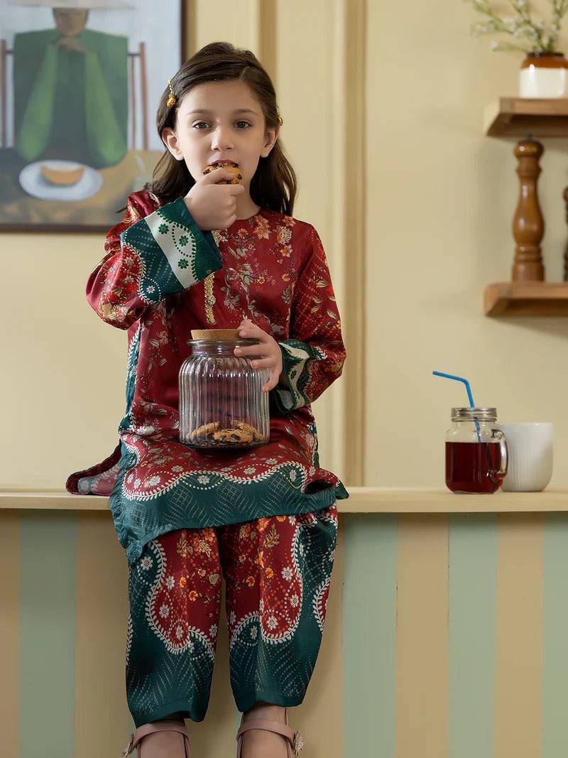 Girl in traditional silk shirt and trousers, casual wear, colorful ethnic clothing, indoor setting