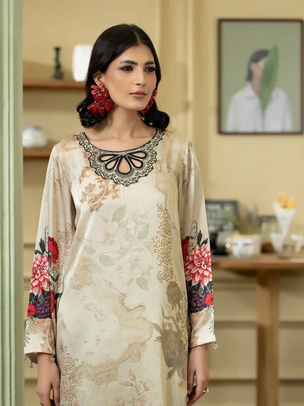 Full view of woman in Rangreza silk 2-piece with floral print and beige trousers
