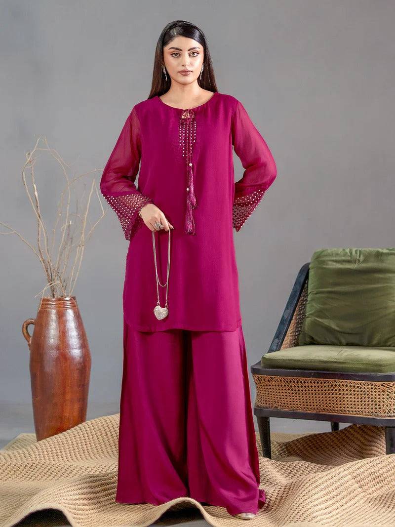 Magenta chiffon 2-piece outfit with embroidered crystal details, long kurta with sheer sleeves, and wide-leg trousers, for casual wear