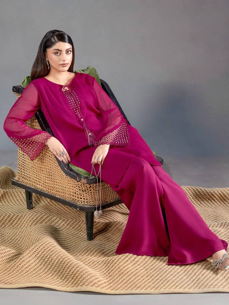 Full-length magenta chiffon 2-piece outfit with wide-leg trousers and embroidered sleeves, styled for casual wear