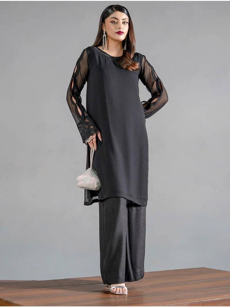 Stylish black chiffon kurta with lace sleeve details and matching trousers