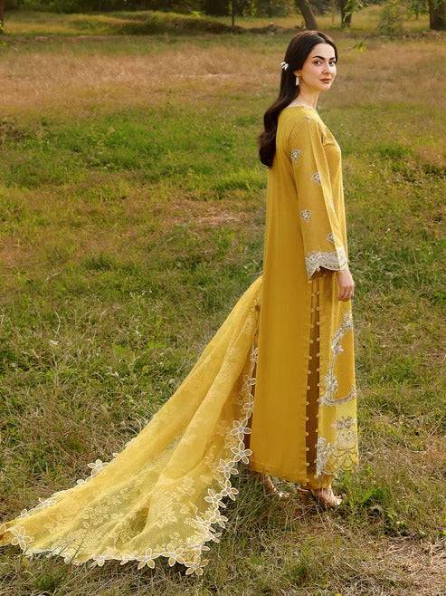 Side view of yellow embroidered kurta with floral dupatta
