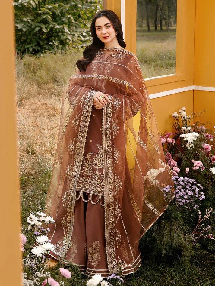 Full-length view of woman in RANGREZA JANAN CINNAMON embroidered sharara suit outdoors