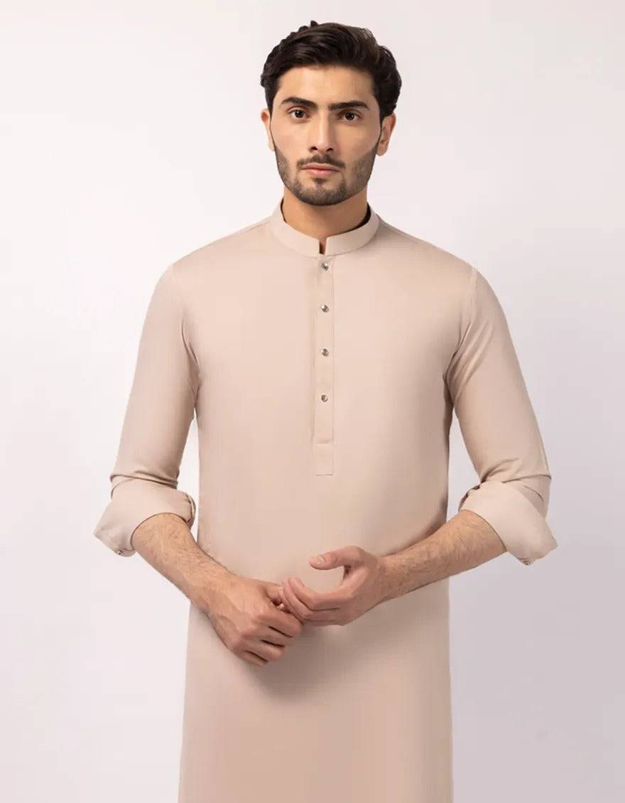 Close-up of beige kurta with silver buttons and mandarin collar