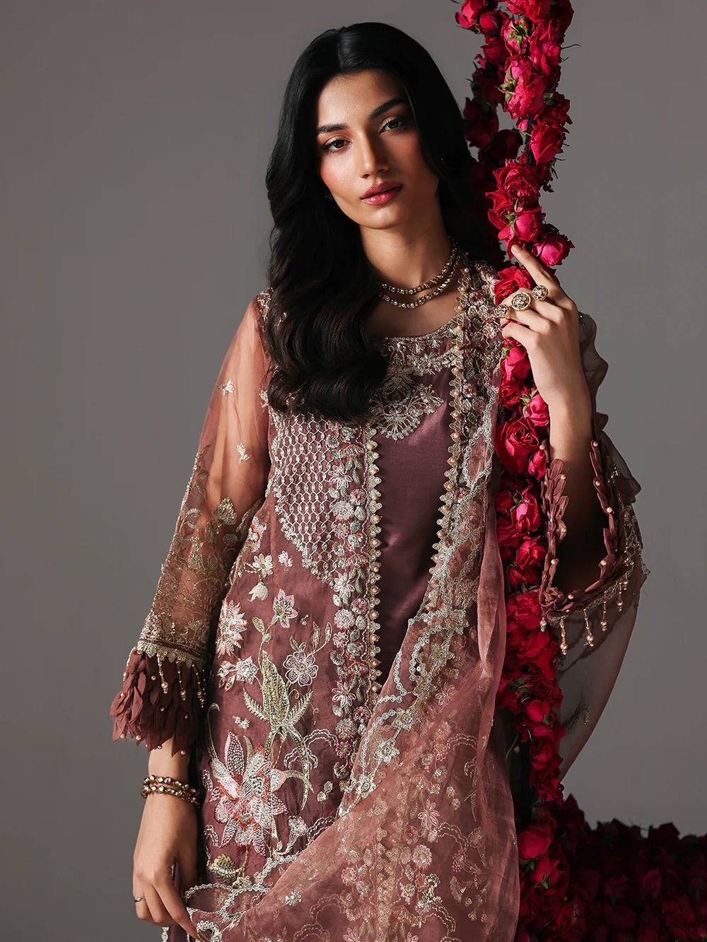 Elegant embroidered maroon traditional dress with floral details and sheer sleeves