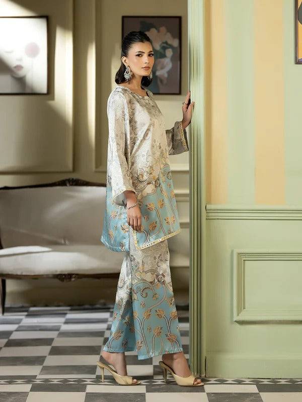 Elegant woman in traditional silk outfit in a stylish indoor setting