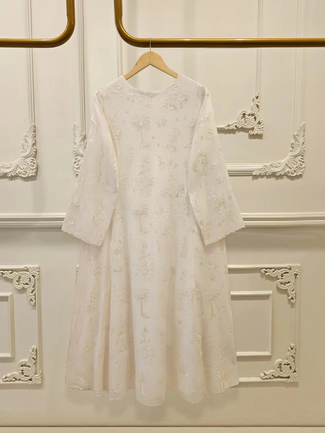 Back view of AGHA NOOR Cotton Net Suit - Pakistani Embroidered | 3 Pc showcasing delicate floral and palm tree embroidery on cotton net fabric.