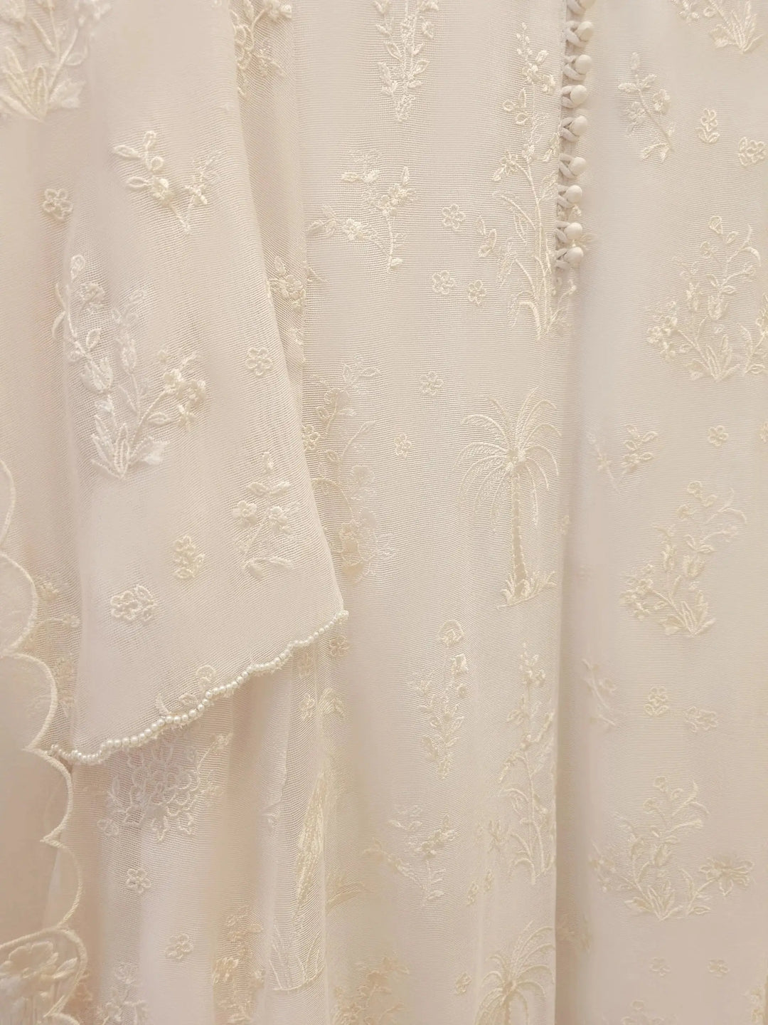 Detailed embroidery on AGHA NOOR Cotton Net Suit - Pakistani Embroidered | 3 Pc featuring palm trees and floral motifs on soft cotton net fabric.