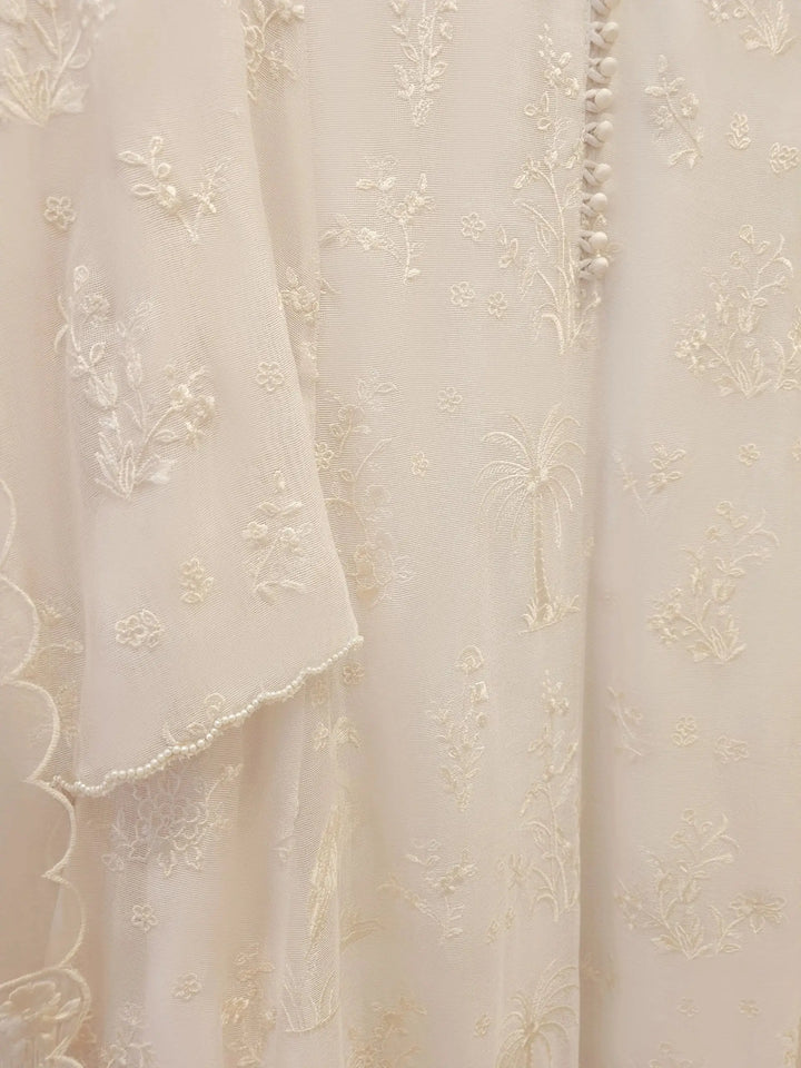 Detailed embroidery on AGHA NOOR Cotton Net Suit - Pakistani Embroidered | 3 Pc featuring palm trees and floral motifs on soft cotton net fabric.