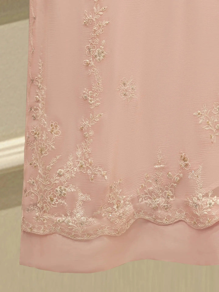 Hemline embroidery of AGHA NOOR Embroidered Chiffon Suit - Dress with floral patterns enhancing the elegance of the pink chiffon shirt.