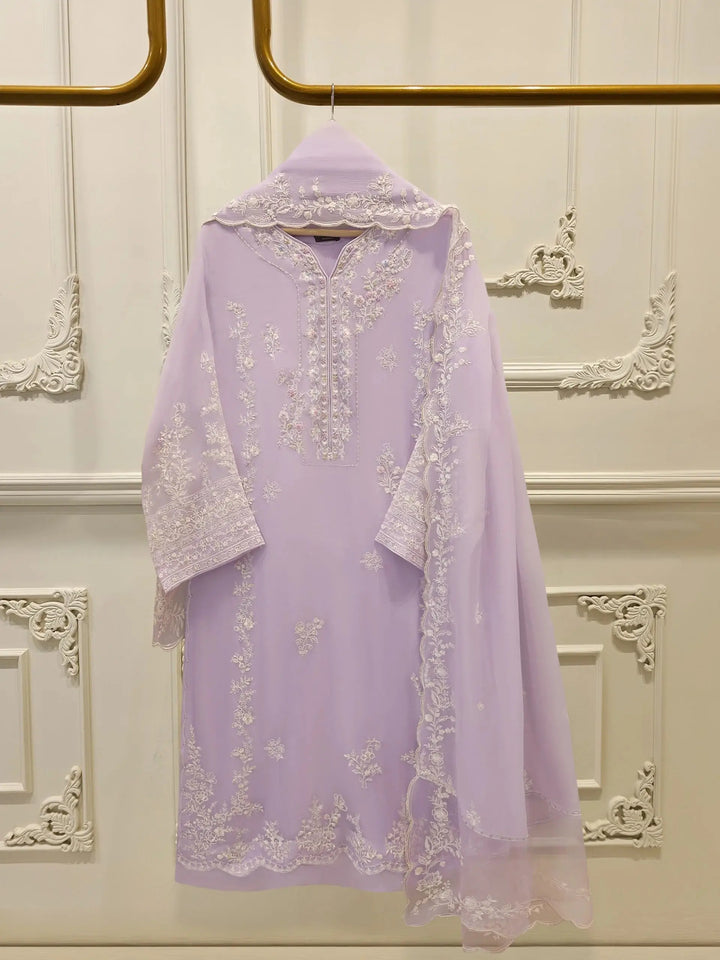 AGHA NOOR Chiffon Suit - Embroidered Elegance in lilac with floral detailing, featuring a chiffon shirt, Korean silk pants, and dupatta.
