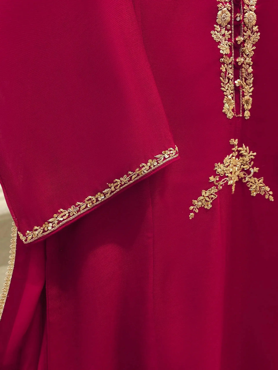 Detailed embroidery on sleeve and waist of AGHA NOOR embroidered cotton net shirt, highlighting fine craftsmanship and traditional design.