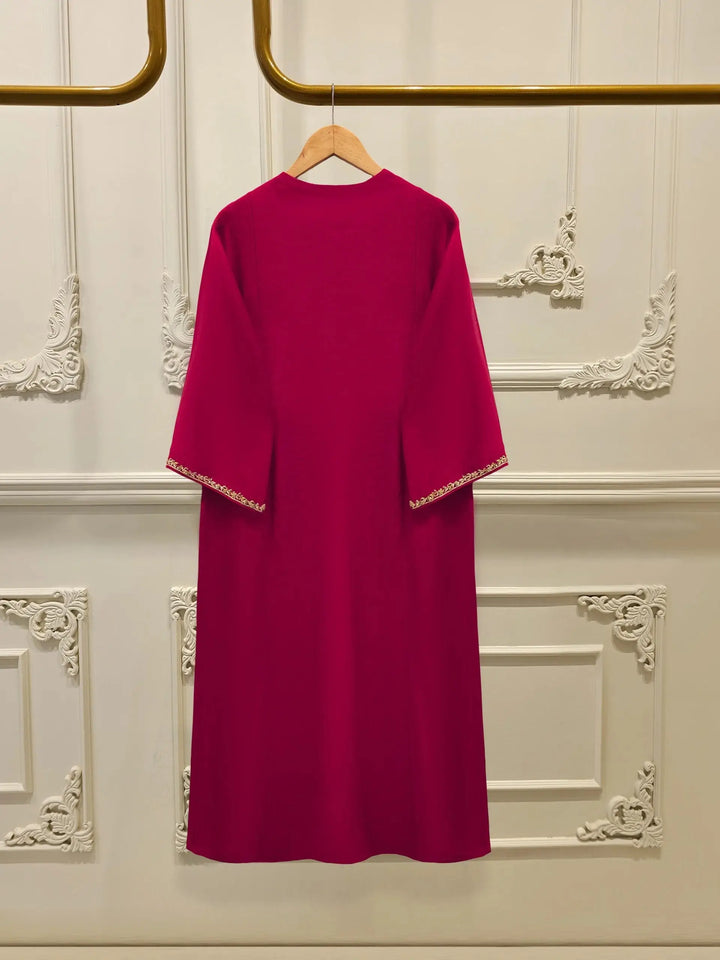 Back view of AGHA NOOR 3 Piece Pure Embroidered Cotton Net Suit in solid deep pink, showcasing plain design with embroidered sleeve edges.