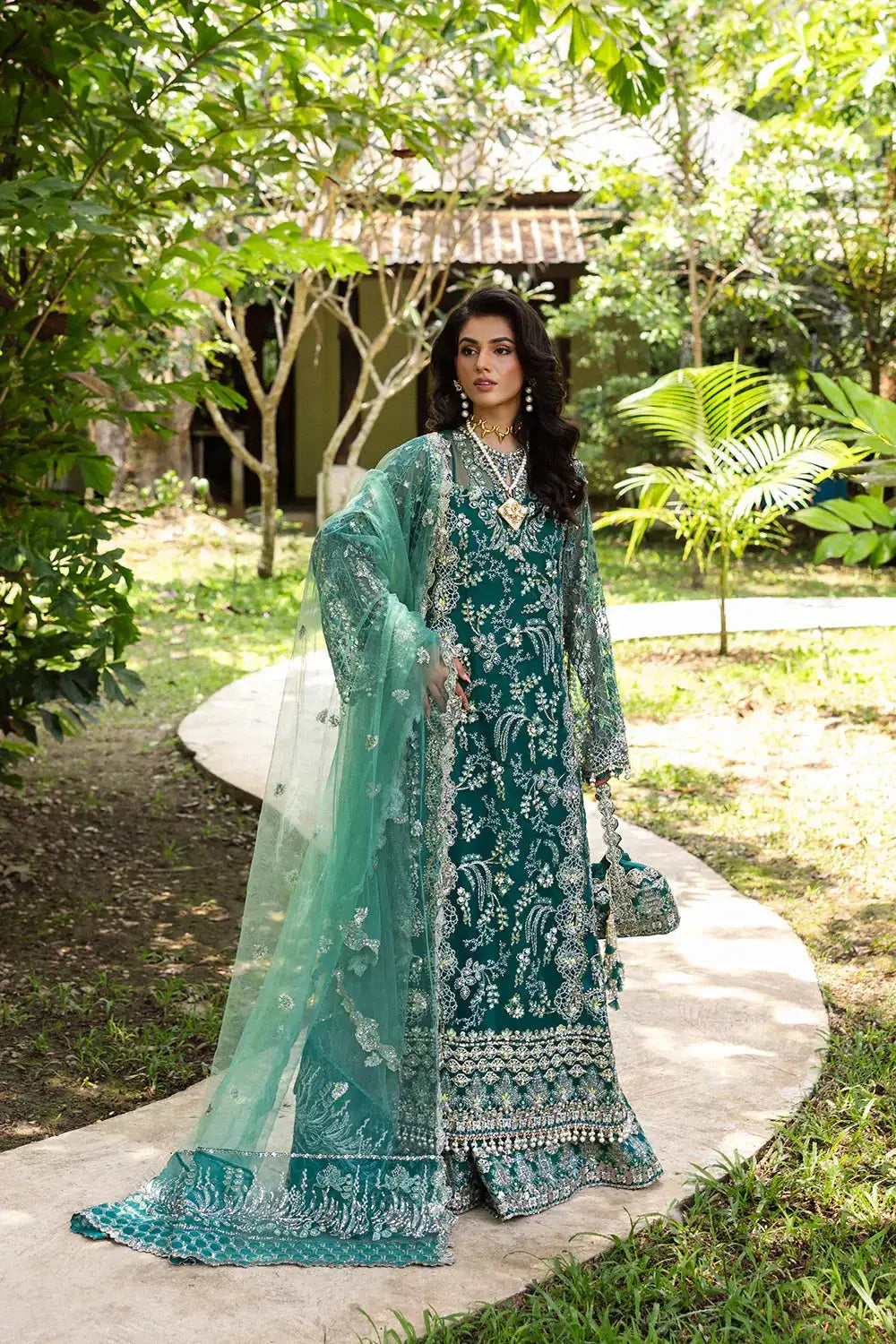 Elegant KIANA-SRF25-04 green formal dress by Saira Rizwan with detailed embroidery, paired with a sheer dupatta for festive occasions.