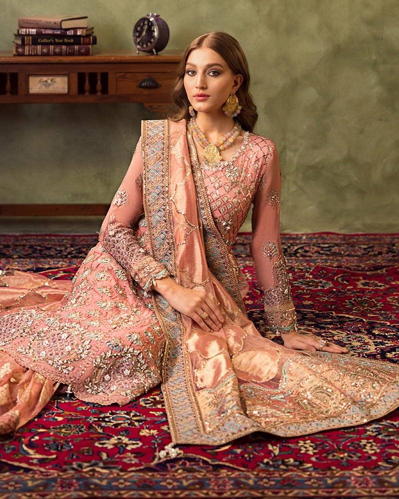 AROOSH Formals AR-96-270 Pakistani wedding outfit featuring intricate embroidery on peplum shirt, ghararah pants, and ornate dupatta in soft pink tones.