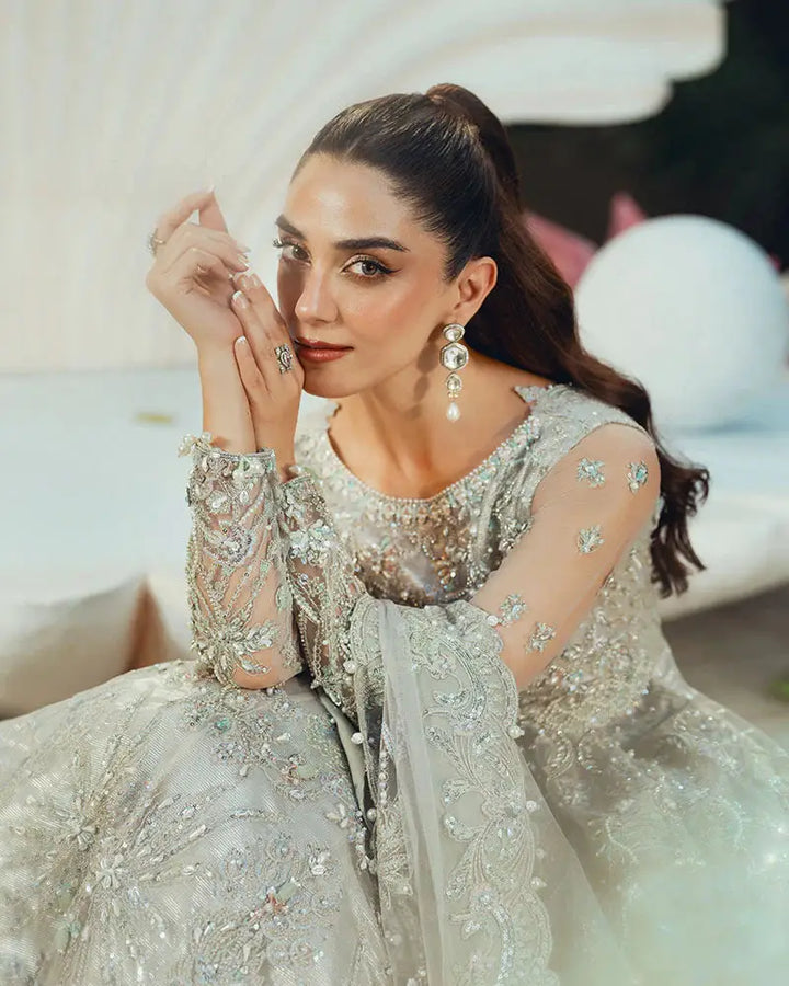 Portrait of model in Formal Wear Crystal AR-138 Pakistani bridal outfit, emphasizing the hand-embellished net sleeves and ornate dupatta.