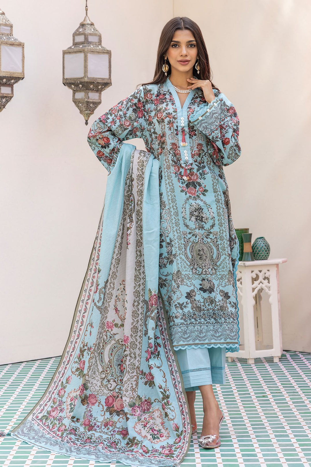 pakistani dresses online usa a woman in a blue dress and shawl