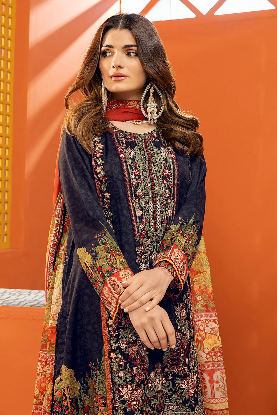 pakistani dresses online usa a woman wearing a black and red dress