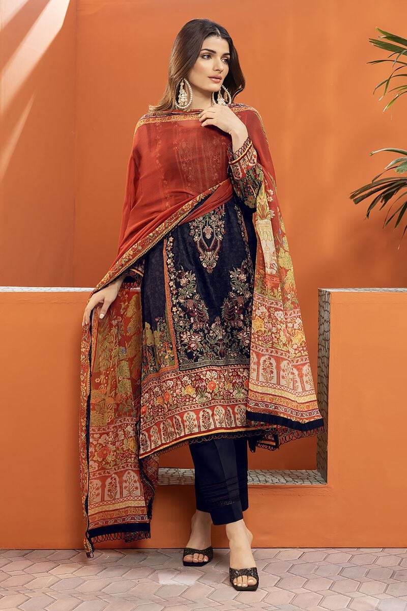pakistani dresses online usa a woman wearing a red and black dress