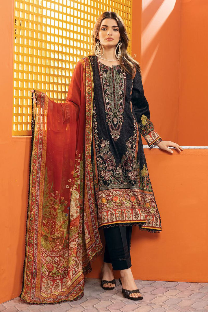 pakistani dresses online usa a woman standing in front of a wall wearing a black and red dress
