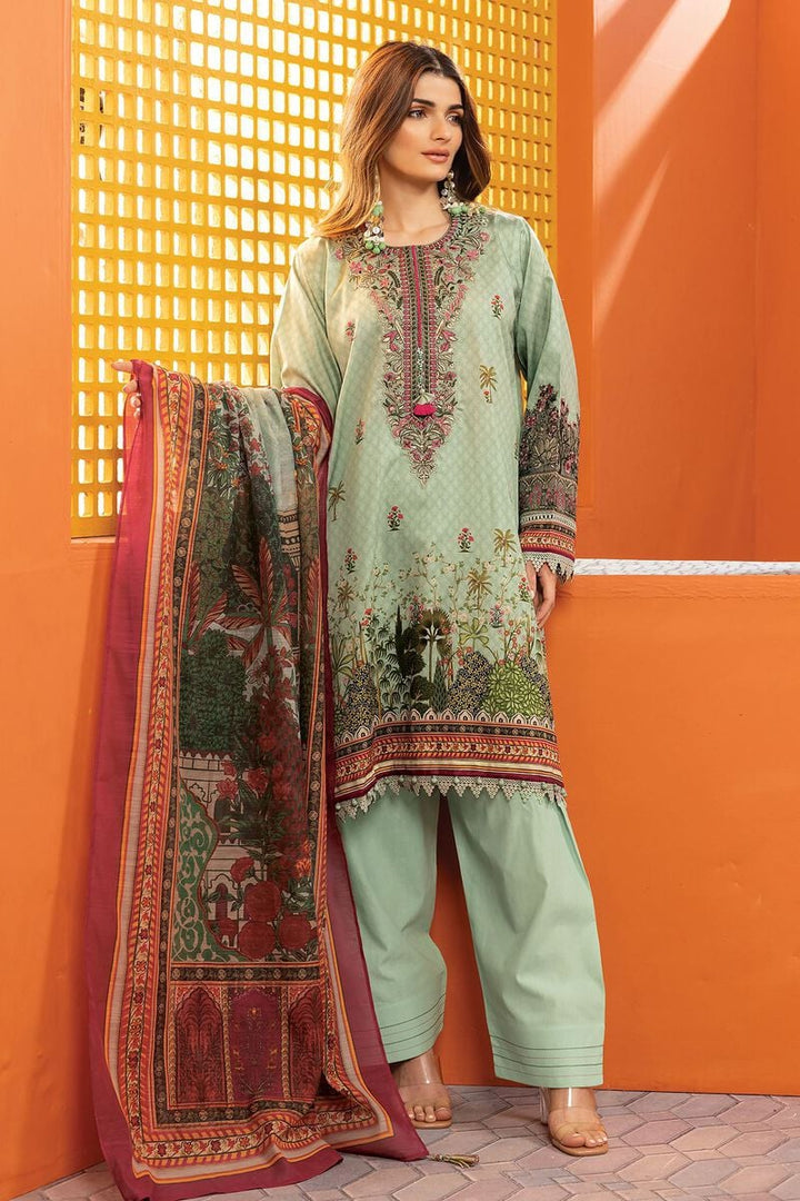 shop pakistani dresses online a woman standing in front of an orange wall