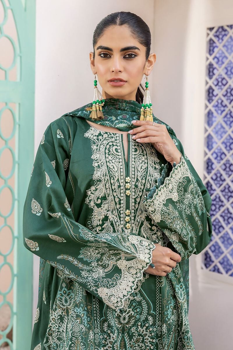 pakistani casual clothes a woman wearing a green and white outfit
