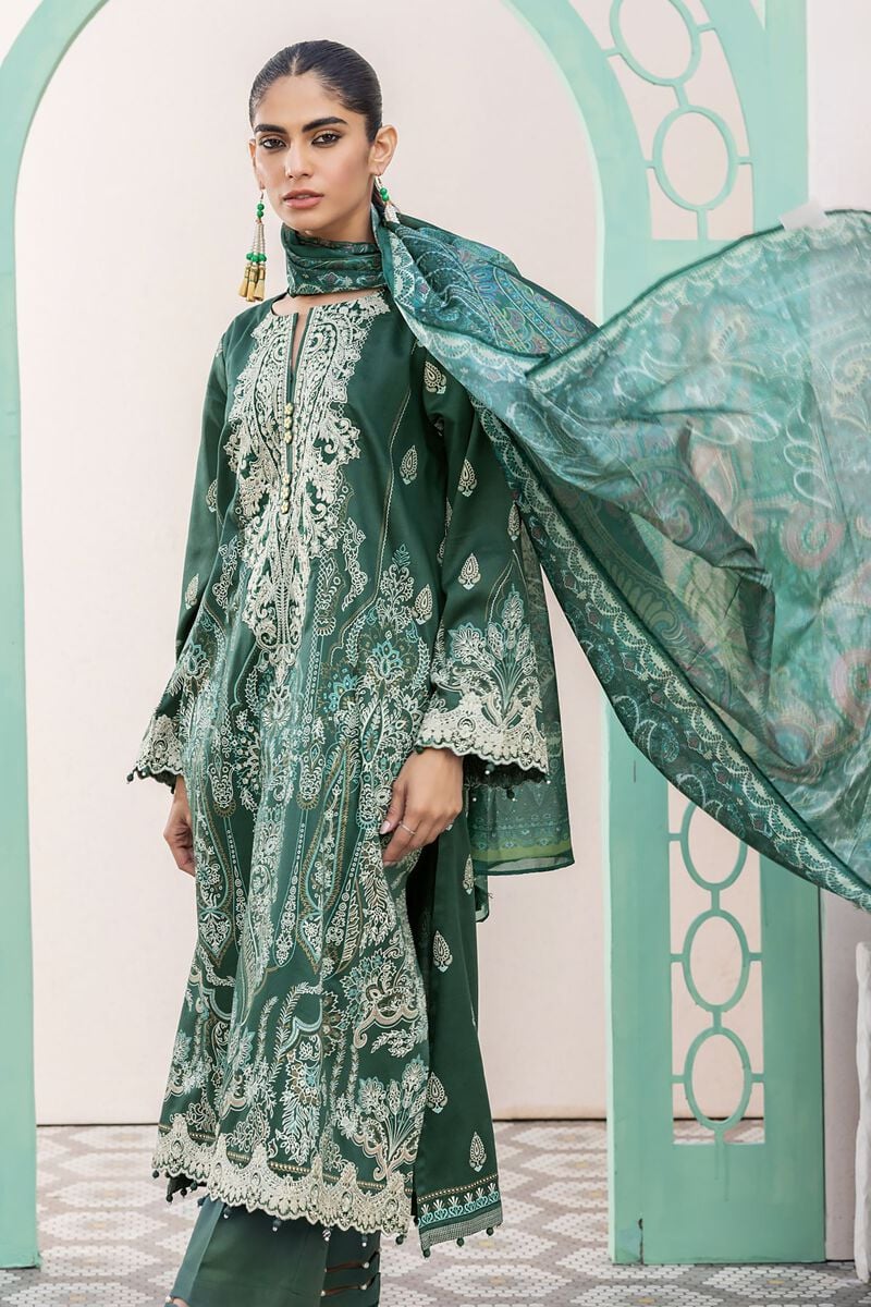 pakistani casual clothes a woman in a green dress with a green shawl