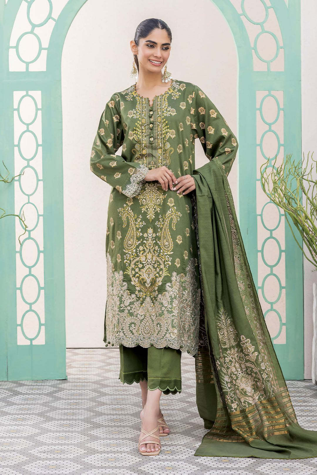 online shopping pakistani dress a woman in a green dress standing in front of a wall