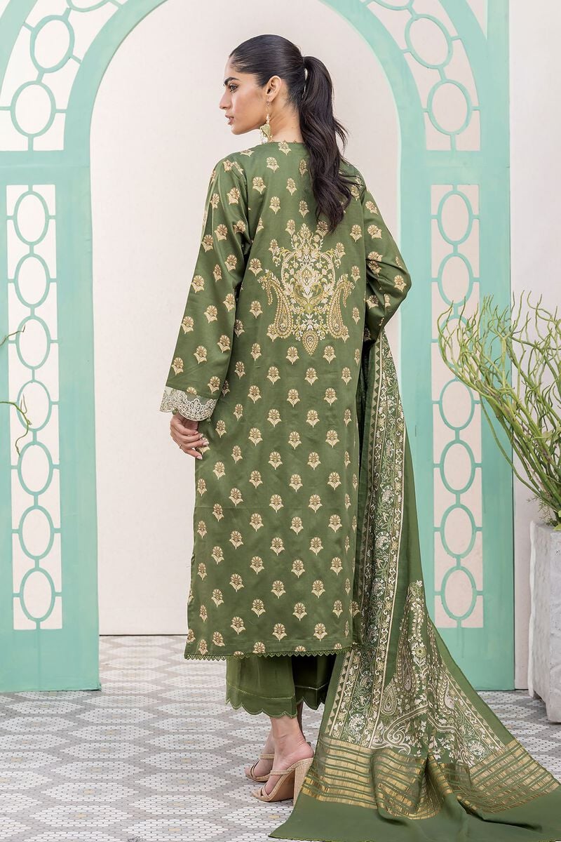 online shopping pakistani dress a woman in a green dress standing in front of a wall