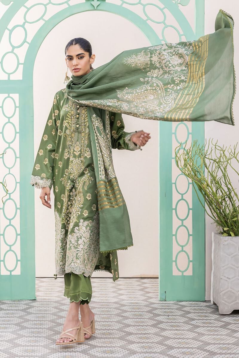 online shopping pakistani dress a woman standing in front of a wall holding a green scarf