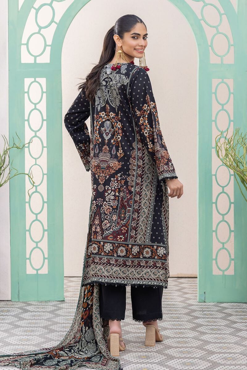 pakistani formal clothes a woman standing in front of a wall