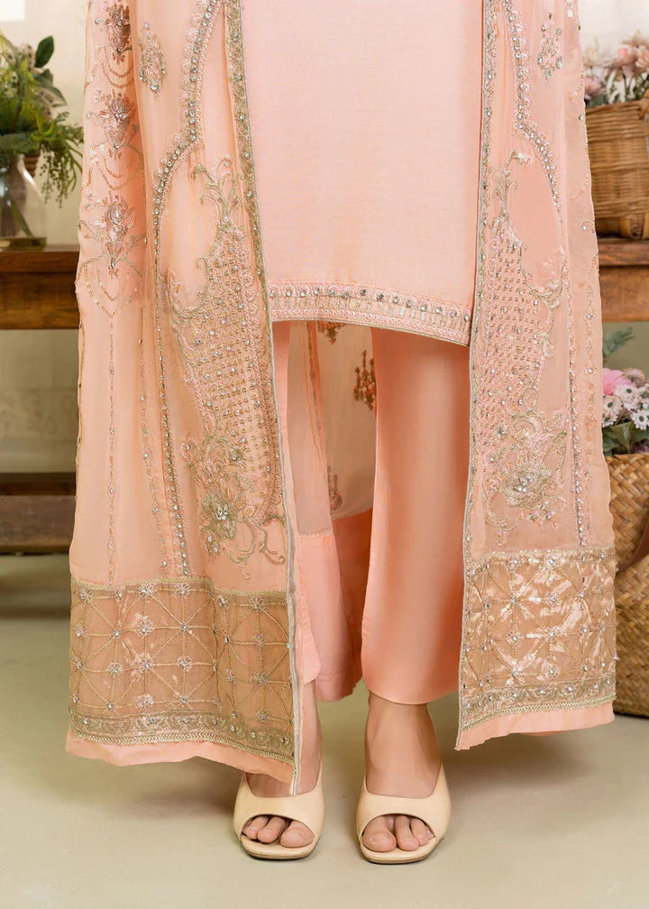 Peach Pakistan gown dress for women with gold embroidered hem, part of elegant shirt pants and dupatta ensemble.