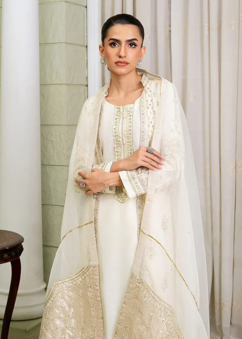Front view of ivory Pakistan gown dress woman with sheer dupatta and ornate embellishments, ideal for festive and formal wear.