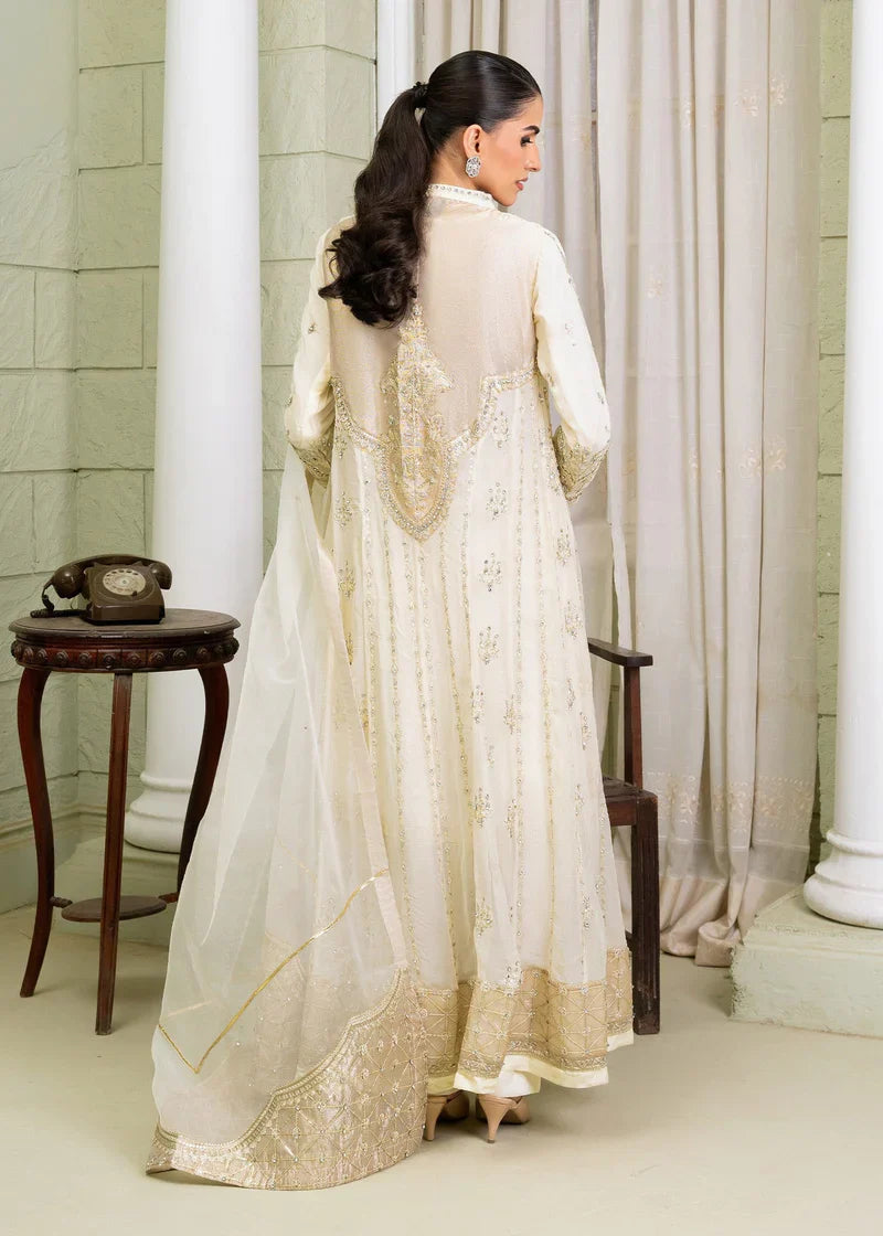 Back view of ivory Pakistan gown dress woman featuring embroidered panel and flowing dupatta, perfect for elegant events.