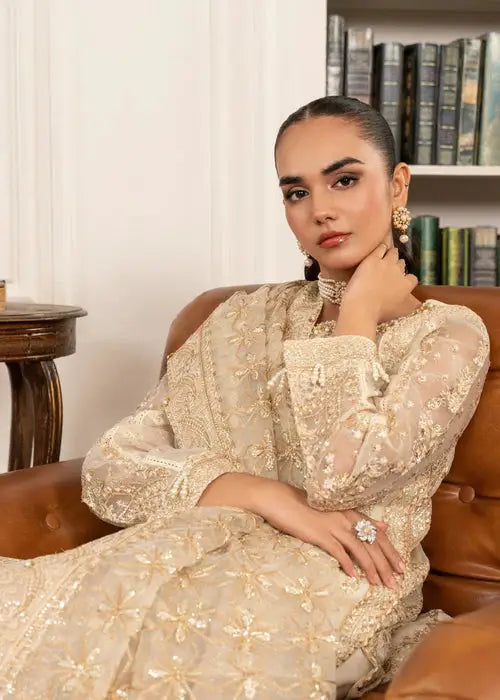 Model seated wearing Wedding Wear Dress AL-3881 pearl kurta set, showcasing rich embroidery and elegant bridal styling.