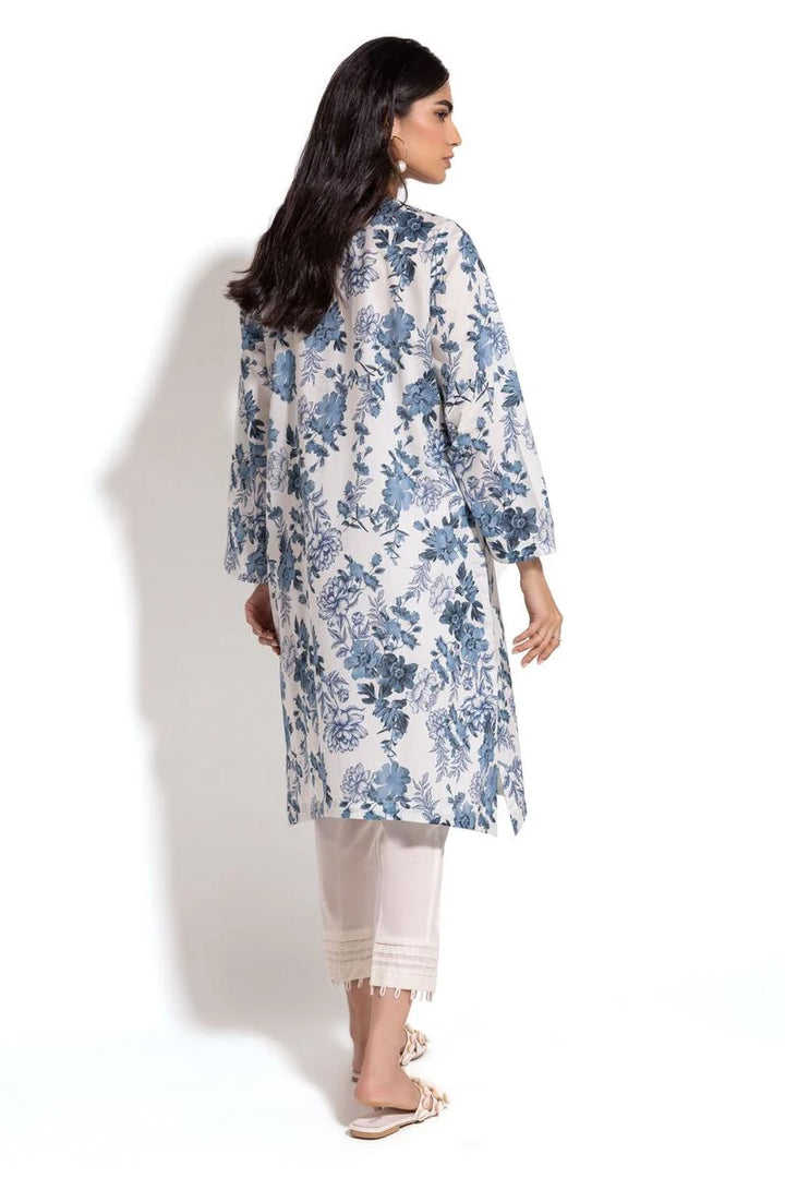 a Khaadi Design woman wearing a blue and white floral print coat