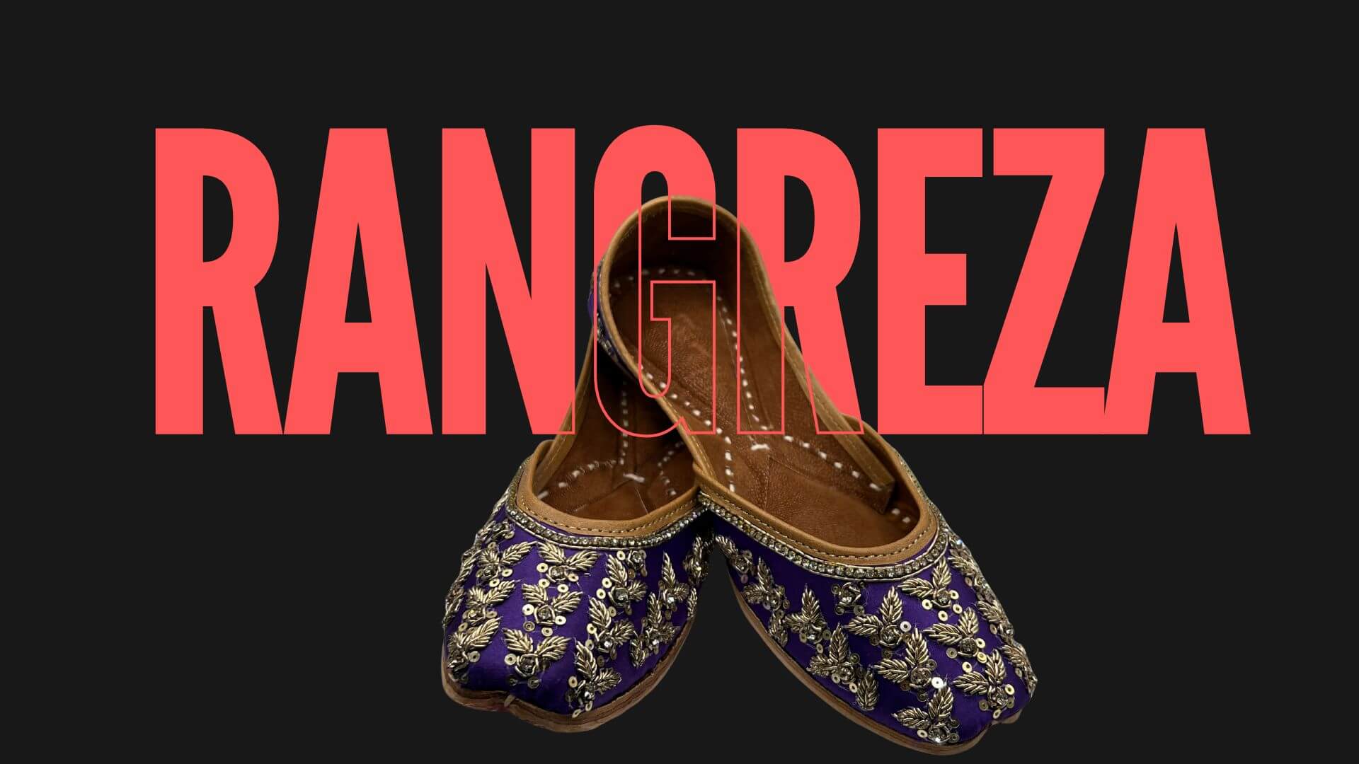 Pair of embroidered Khussa shoes with 'Rangreza' text in red on a black background