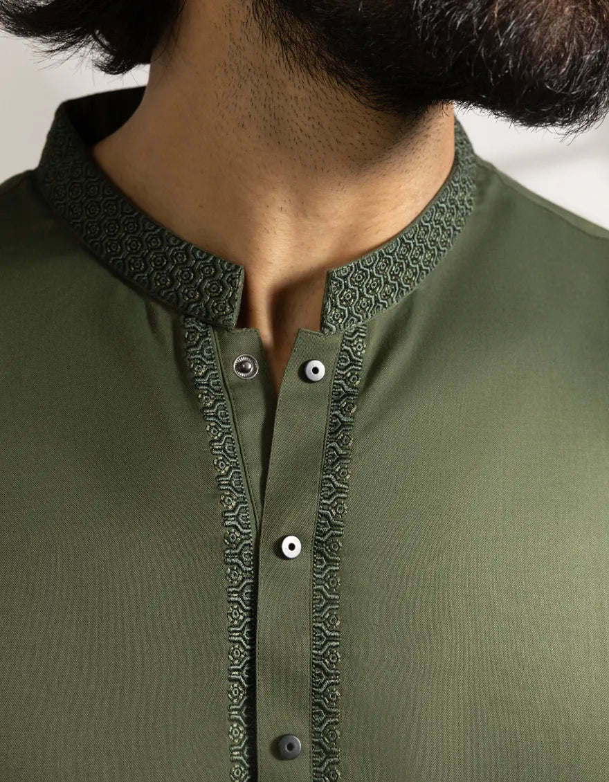 Green Kameez Shalwar - Semi-Formal | Blended Fabric zoomed-in detail of the embroidered band collar and button placket on the green kameez.