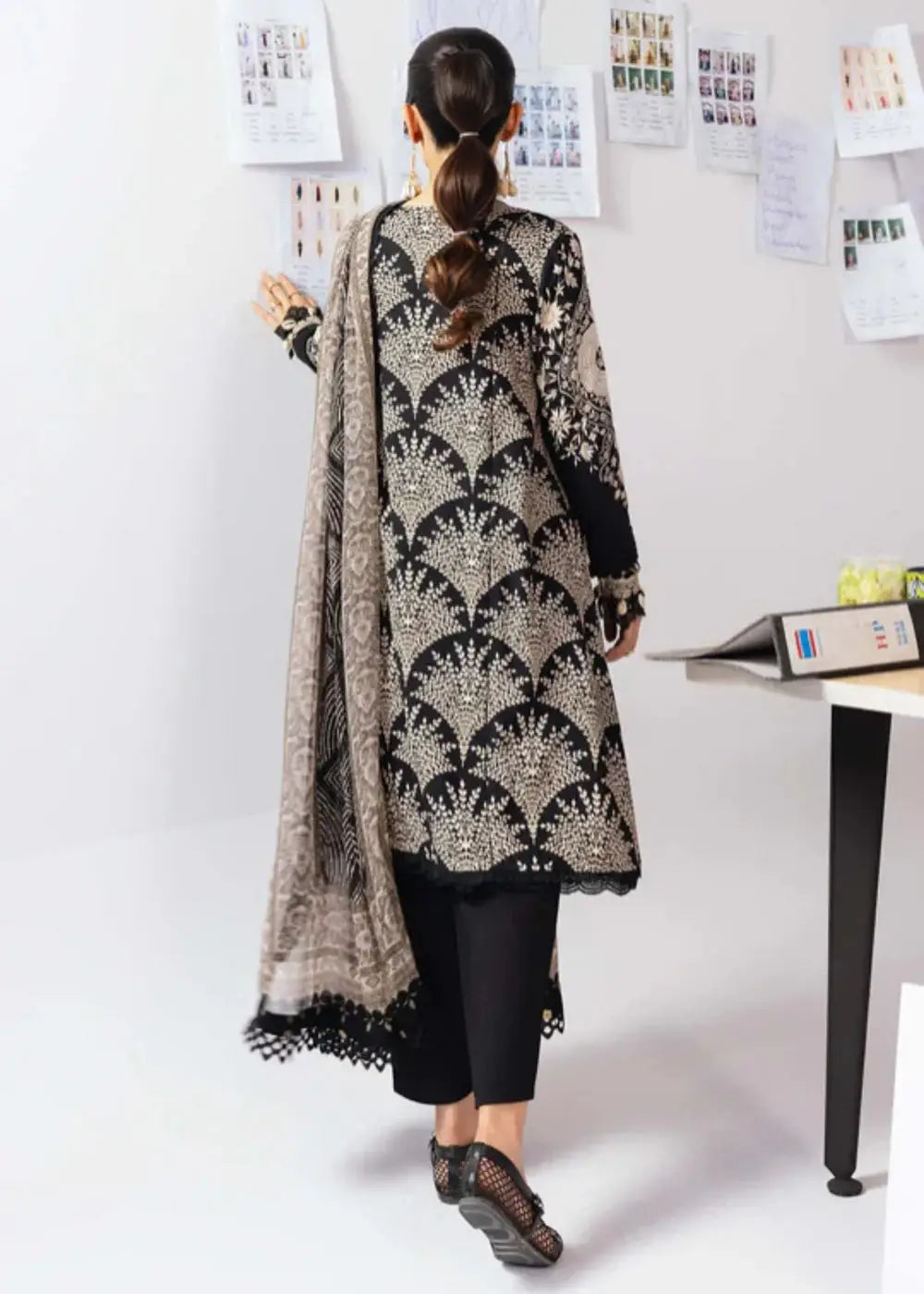 Back view of MB-CUS25-1108-A stitched Maria B outfit showing intricate embroidery on black marina twill shirt with matching chiffon dupatta and linen trouser.